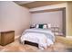 Cozy bedroom with neutral tones, a comfortable bed, and stylish accents for a relaxing ambiance at 8018 Williams Fork Ave, Littleton, CO 80125