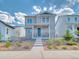Charming two-story home with stone accents, well-maintained landscaping, and inviting entryway at 8018 Williams Fork Ave, Littleton, CO 80125