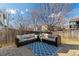 Outdoor patio with cushioned furniture and a rug in a fenced backyard at 20349 E Powers Pl, Centennial, CO 80015