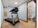 Basement featuring exercise equipment with a bright restroom on the right at 20349 E Powers Pl, Centennial, CO 80015