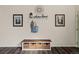 Welcoming entryway with stylish decor, storage bench, and modern accents at 20349 E Powers Pl, Centennial, CO 80015