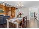 Open living area showcases wood floors, built-in shelving, and flows into the dining area at 20349 E Powers Pl, Centennial, CO 80015