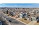 Aerial view showcasing the home's position on a quiet street with well-maintained landscaping at 20349 E Powers Pl, Centennial, CO 80015