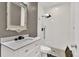 Modern bathroom with a walk-in shower, sleek vanity, and elegant fixtures at 11670 S Flower Mound Way, Parker, CO 80134