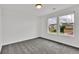 Bedroom showcasing natural light, carpeting, and neutral-toned walls at 11670 S Flower Mound Way, Parker, CO 80134