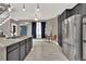 Open-concept kitchen with granite countertops, stainless steel appliances, and a breakfast nook at 11670 S Flower Mound Way, Parker, CO 80134