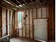 Framed interior showcases window and door, highlighting structural elements for renovation or custom design at 2801 Champa St, Denver, CO 80205