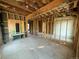 Renovated interior showing exposed framework and brick, ready for customization and modern updates with ample natural light at 2801 Champa St, Denver, CO 80205