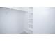 A closet with a shelf and rod is ready to be organized to your needs at 9155 E Center Ave # 4B, Denver, CO 80247