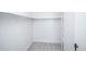 An organized closet with a shelf and a metal rod for hanging clothes at 9155 E Center Ave # 4B, Denver, CO 80247