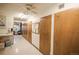 Community hallway has many secured access doors and a seating area at 9155 E Center Ave # 4B, Denver, CO 80247