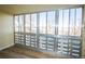 The sun room has large windows with views of the open area at 9155 E Center Ave # 4B, Denver, CO 80247