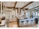 Bright kitchen featuring sleek appliances, a large island, and modern finishes at 14115 Blue Stem St, Broomfield, CO 80020