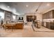 Inviting living room with wet bar and stylish modern decor at 14115 Blue Stem St, Broomfield, CO 80020