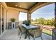 Outdoor patio featuring an elegant dining space and views of the neighborhood at 14115 Blue Stem St, Broomfield, CO 80020