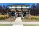 Beautiful brick community clubhouse with pergola entry and bench at 12841 Galapago St, Westminster, CO 80234