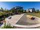 Landscaped community park area with benches and walking paths at 12841 Galapago St, Westminster, CO 80234