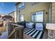 A lovely deck showcasing outdoor seating area with chairs, cushions and a grill for entertaining at 12841 Galapago St, Westminster, CO 80234