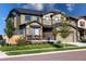 Charming two-story home featuring stone accents, covered porch and well-maintained lawn at 12841 Galapago St, Westminster, CO 80234