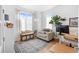 Well-lit home office featuring a comfortable chair, a desk, and neutral décor at 12841 Galapago St, Westminster, CO 80234