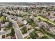 Scenic aerial view of a home in a lush neighborhood with mature trees at 8424 E Otero Cir, Centennial, CO 80112
