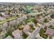 Overhead view of a home in a tranquil neighborhood with parks and tennis courts at 8424 E Otero Cir, Centennial, CO 80112