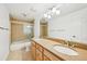 Bathroom featuring double sink vanity and shower over tub at 8424 E Otero Cir, Centennial, CO 80112