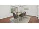 Formal dining room with stylish table, chairs, and neutral décor at 8424 E Otero Cir, Centennial, CO 80112