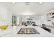 Well-appointed kitchen with open layout, granite countertops, and island seating at 8424 E Otero Cir, Centennial, CO 80112