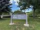 Apple Meadows Park has a beautiful sign surrounded by lush landscaping, offering a great place for families at 18445 W 59Th Dr, Golden, CO 80403
