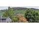 Charming home near a grassy mountainside offers stunning nature views from every window at 18445 W 59Th Dr, Golden, CO 80403