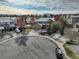 Aerial view of a home on a cul-de-sac featuring a landscaped yard and a tranquil neighborhood setting at 4810 Mountain Gold Run, Broomfield, CO 80023