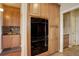 Kitchen features double wall oven, light wood cabinets and backsplash at 4810 Mountain Gold Run, Broomfield, CO 80023