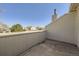 Outdoor balcony offering neighborhood views and a relaxing place to sit outdoors and enjoy fresh air at 5075 Garrison St # 3, Wheat Ridge, CO 80033