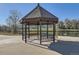 Community gazebo alongside a pond, with a seating area to sit and enjoy the scenery at 5075 Garrison St # 3, Wheat Ridge, CO 80033