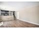 This living room features hardwood floors and access to the lower level at 19876 E Brunswick Dr, Aurora, CO 80013