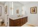 Well-lit bathroom with a marble countertop, modern fixtures, and sleek tile accents at 6767 Timbers Dr, Evergreen, CO 80439
