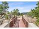 Scenic outdoor pathway leading to a tranquil retreat with beautiful panoramic views at 6767 Timbers Dr, Evergreen, CO 80439
