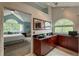 Open concept bathroom features a double sink vanity and views into bedroom at 6255 Collegiate Dr, Highlands Ranch, CO 80130