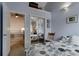 Well-lit bedroom with vaulted ceilings and a mirrored closet at 6255 Collegiate Dr, Highlands Ranch, CO 80130