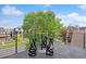 Outdoor patio area features a set of outdoor bar stools and beautiful neighborhood views at 2391 King St, Denver, CO 80211