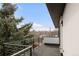 Balcony offers a tranquil outdoor retreat with leafy trees enhancing privacy at 2391 King St, Denver, CO 80211