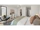 Bright main bedroom with modern decor, including stylish furnishings and soft, natural lighting at 2391 King St, Denver, CO 80211