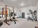 Home gym featuring workout equipment and mirrors at 1374 Crested Butte Ct, Evergreen, CO 80439