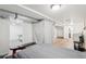 Finished basement area with wood flooring and open layout, perfect for recreation and relaxation at 2203 S Lincoln St, Denver, CO 80210