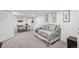 Finished basement with a daybed, ping pong table, and neutral carpeting at 2203 S Lincoln St, Denver, CO 80210