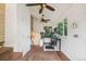 Sunroom featuring brick detailing, lots of natural light and multiple ceiling fans at 2203 S Lincoln St, Denver, CO 80210