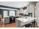 Modern kitchen with sleek countertops and black backsplash detailing at 2845 Hudson St, Denver, CO 80207