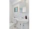 Classic bathroom with white fixtures and simple, clean design at 6083 S Glencoe Way, Centennial, CO 80121