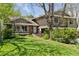 Charming home featuring a well-manicured lawn and mature landscaping in the front yard at 6083 S Glencoe Way, Centennial, CO 80121